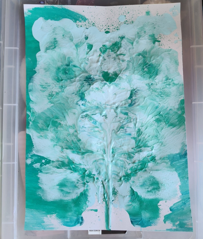 Mint and white acrylic pour